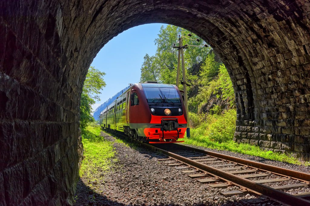 a-commuter-train-pulls-into-a-tunnel-2021-08-30-23-07-23-utc