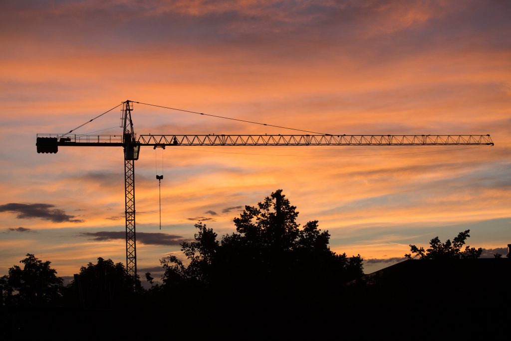 silhouette-of-the-construction-site-on-sunset-back-2021-10-12-15-38-50-utc