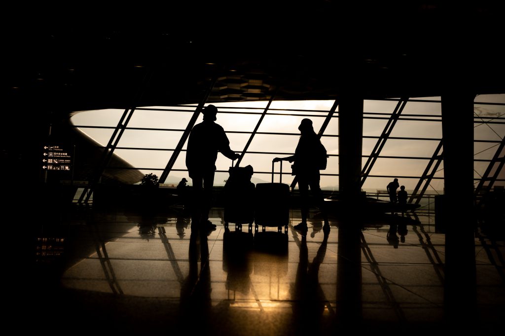 traveler-couple-person-travel-at-aerodrome-with-ba-2022-02-08-04-17-02-utc