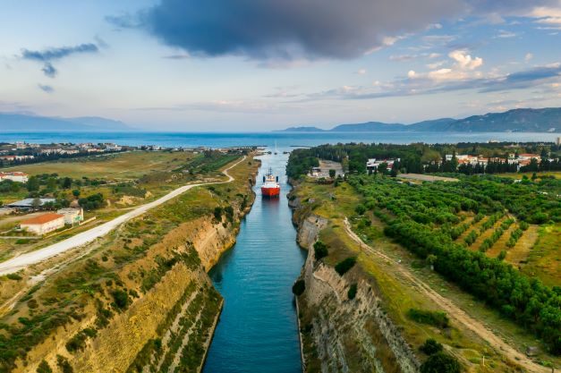 ship-passing-through-corinth-canal-in-greece-2021-08-26-19-00-32-utc