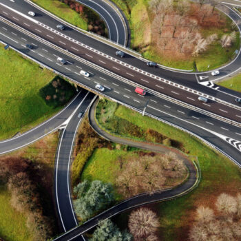 Aerial view of curvy road junctions and highway