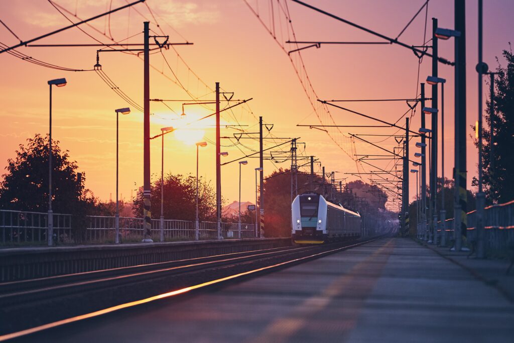 Passenger train at sunrise.